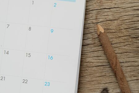 White calendar on wood texture.の写真素材