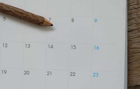 White calendar on wood texture.の写真素材