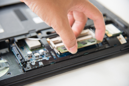 Hand packing electronic board.の写真素材