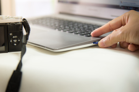 Modern Digital Camera, Laptop Computer and Display.の写真素材