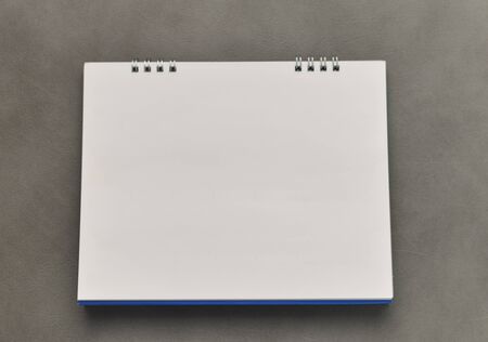 blurred calendar in planning concept on leather texture.の写真素材