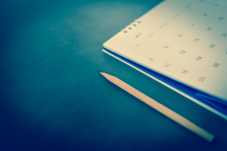 blurred calendar in planning concept on leather texture.の写真素材