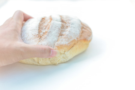 Fresh fragrant bread on the table.の写真素材