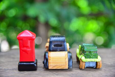 Toy car on wood texture.の写真素材