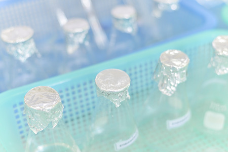 Glass tube laboratory equipment in white lab.の写真素材