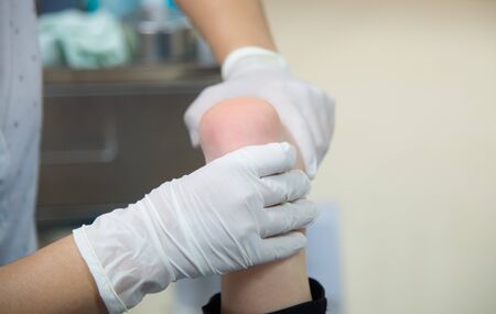 Close up hand Physicist physical therapy treatment patient in clinic.