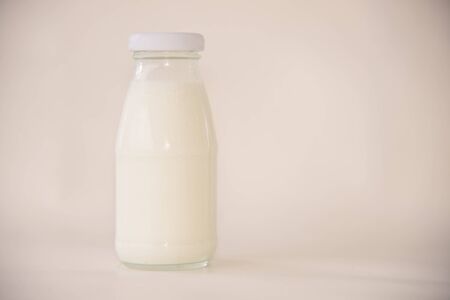 milk in glass on table healthy concept.の写真素材