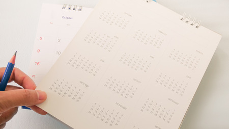 Blurred calendar page on white background.の写真素材
