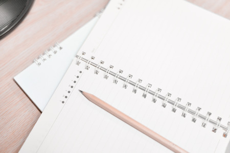 Blur pencil and notebook diary concept in white tone.の写真素材