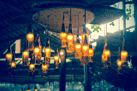 Close up vintage lamp hand made in dark tone.の写真素材