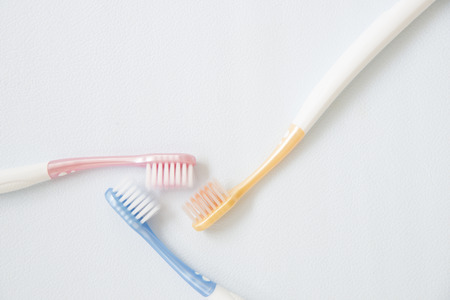 Toothbrush on white background oral cavity healthy concept.flat lay style.