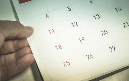 Blurred calendar page dark toneの写真素材