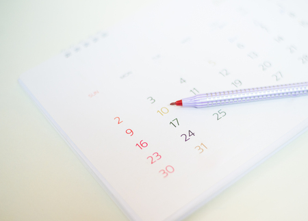 Calendar with pen in  planning concept.の写真素材