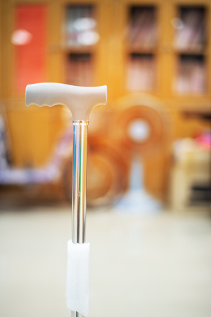 Close-up Of Women Walking With Crutches on blur background.の写真素材