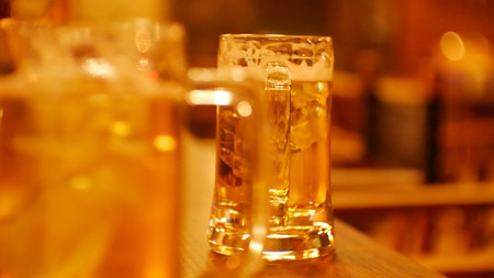 Close up Beer on bar in drinking concept.の写真素材