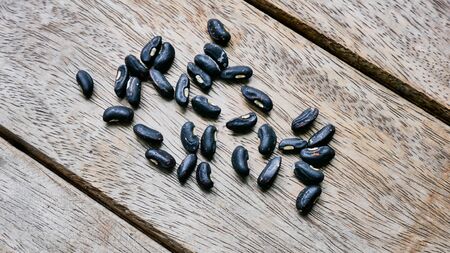 Close up pea on wood texture in planting concept.の写真素材