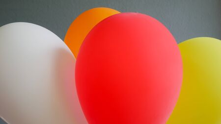 Close up group of balloon on grey background.の写真素材