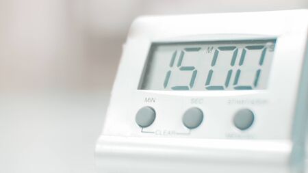 Clock in counting dow concept on blur background.の写真素材