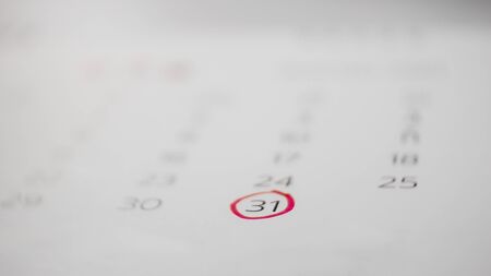 Red marking on calendar page planning concept.の写真素材