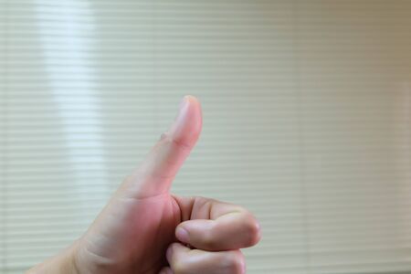 Close up hand on blur background.Past of body.の写真素材