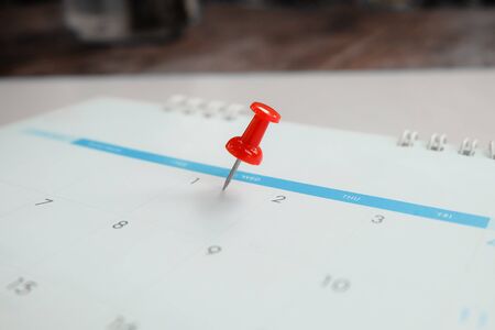 Close up red pin on calendar marking on Valentine's Day.Love concept.