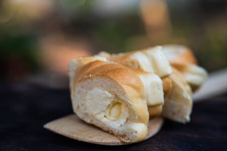 Fresh breads on table in homemade cooking concept.の写真素材