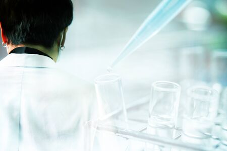 Double exposure laboratory background in diagnostic coronavirus or covid-19 virus.