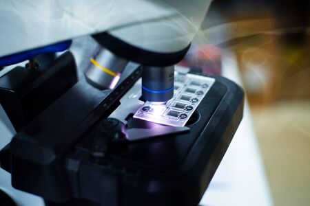 Double exposure laboratory background in diagnostic coronavirus or covid-19 virus.
