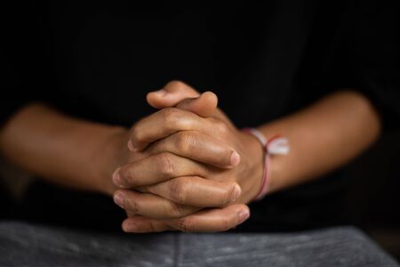 Close up hand male  on dark background.の写真素材