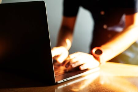 Blurred people using laptop in network connection concept.の写真素材