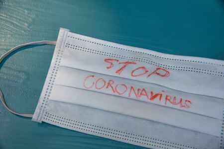Surgical mask with protected and stop coronavirus or COVID-19 virus concept.の写真素材
