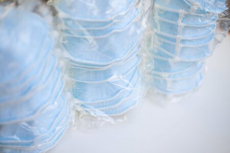 packing surgical mask N95 with protection corona orCovid-19 virus.Selling surgical mask concept.の写真素材