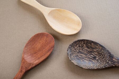 Close up spoon wooden on wood texture in cooking concept.の写真素材