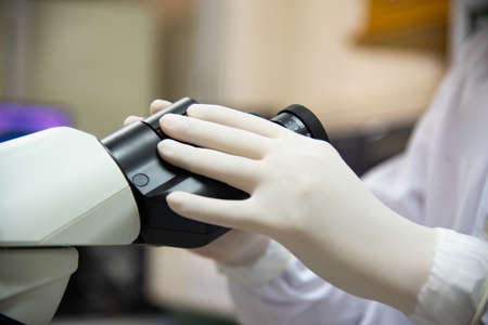 MIcroscope in laboratory with blur  background.Laboratory concept.の写真素材