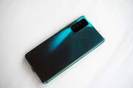 Close up smartphone on white background.Technology concept.