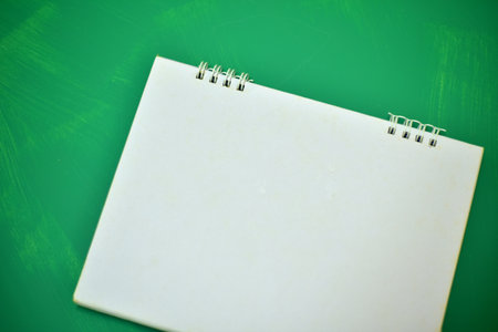 Blurred calendar on green texture background.の写真素材