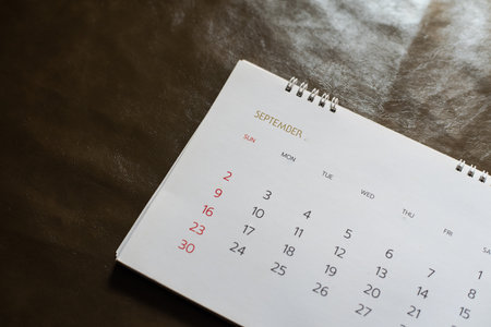 White calendar on leather background.in planning concept.の写真素材