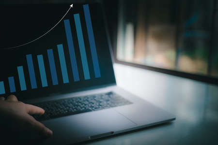 Blurred latop in dark tone technology concept.の写真素材