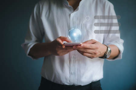 hand holding a Earth globle in technology and communication concept.の写真素材