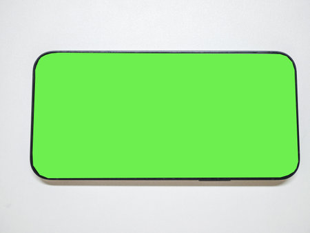 Smartphone with green screen in tecnology communication concept.の写真素材