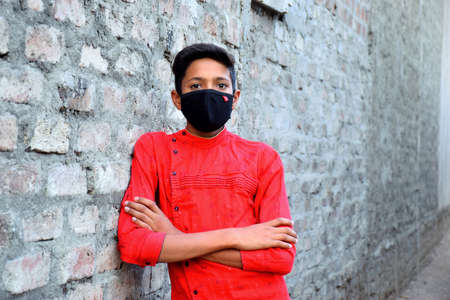 13 years old Asian cute boy wearing protective mask, prevention of Corona virus (Covid -19) and pollution.の写真素材