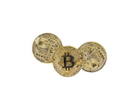 Closeup Three gold bitcoin on white isolated background digital money concept,cryptoの写真素材