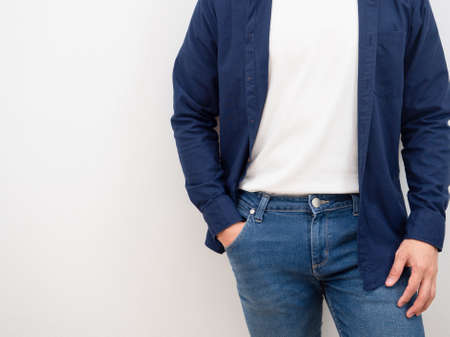 Closeup man jean suit put hand in pocket on white isolated backgroundの写真素材