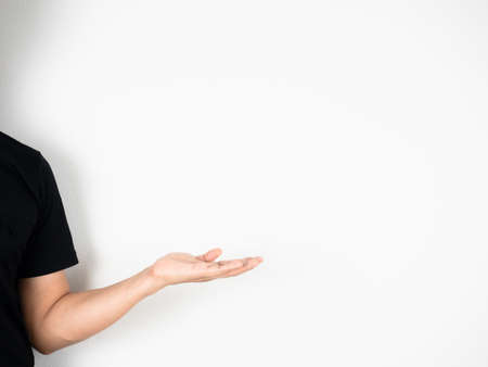 Man show hand empty on white isolated background copy spaceの写真素材