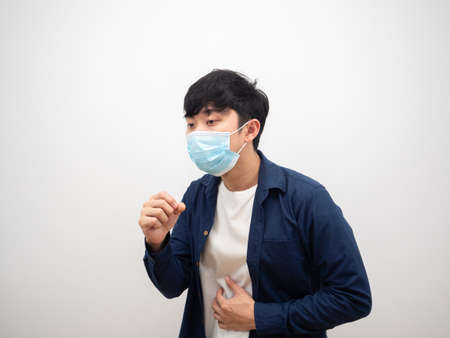 Thai man with protect mask cough feel bad and sick on isolated white backgroundの写真素材