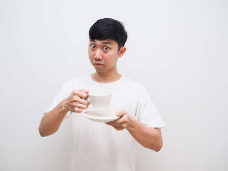 Asian man holding coffee cup invite to taste face white background