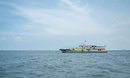Tourism ship on the ocean and blue sky landscape,Travel boat concept for transport traveler in Thailand with beautiful sea and skyの写真素材