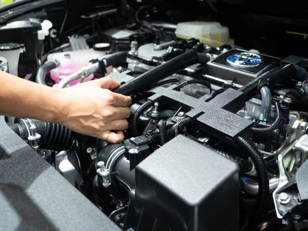 Hand checking equipment interior engine of carの写真素材