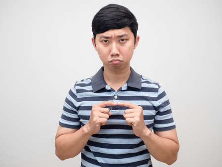 Young man striped shirt feel guilty portrait isolated,Man make mistake