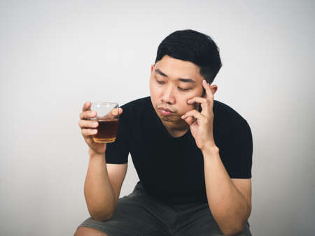 Asian man alcoholism sitting feels lonely